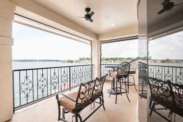 392 Green Cove Dr, Montgomery, TX 77356 - balcony featuring a ceiling fan and a water view
