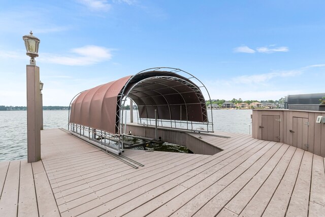 392 Green Cove Dr, Montgomery, TX 77356 - view of dock with a water view and boat lift