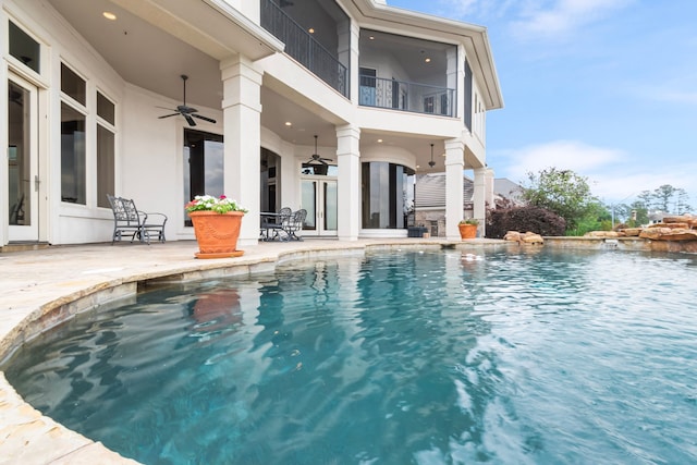 392 Green Cove Dr, Montgomery, TX 77356 - outdoor pool featuring a patio and ceiling fan