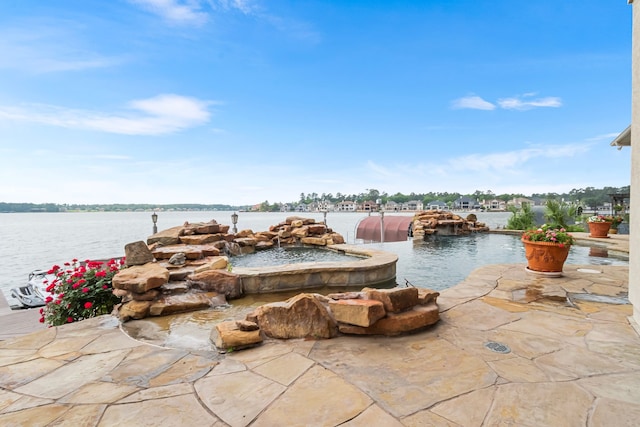 392 Green Cove Dr, Montgomery, TX 77356 - view of swimming pool featuring a water view