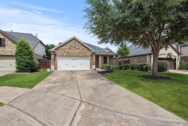 ranch-style house with a front lawn, fence, brick siding, an attached garage, and driveway