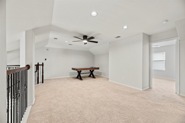 bonus room featuring ceiling fan, light carpet, lofted ceiling, and visible vents