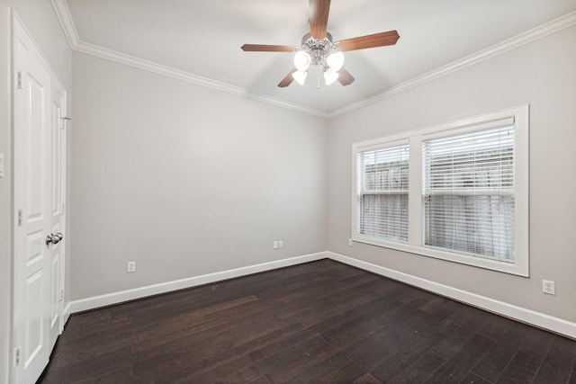 spare room with baseboards, a ceiling fan, dark wood-style floors, and ornamental molding