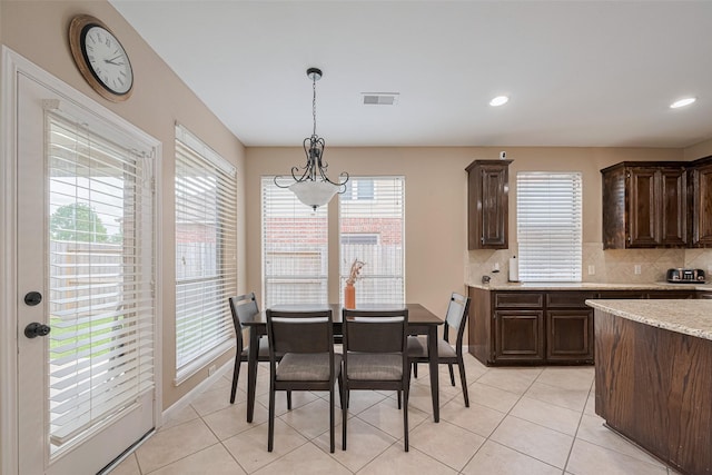 dining room with visible vents, recessed lighting, and light tile patterned floors