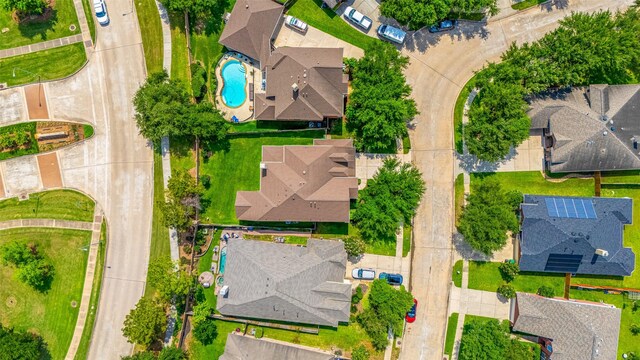 birds eye view of property with a residential view