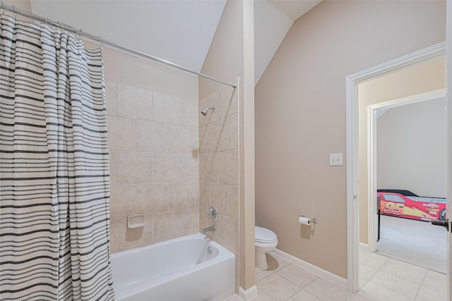 bathroom featuring tile patterned floors, baseboards, toilet, and shower / tub combo