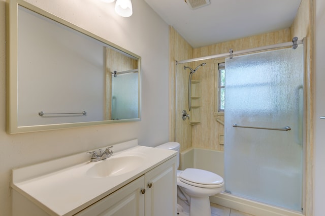 bathroom with toilet, visible vents, tile patterned flooring, and vanity