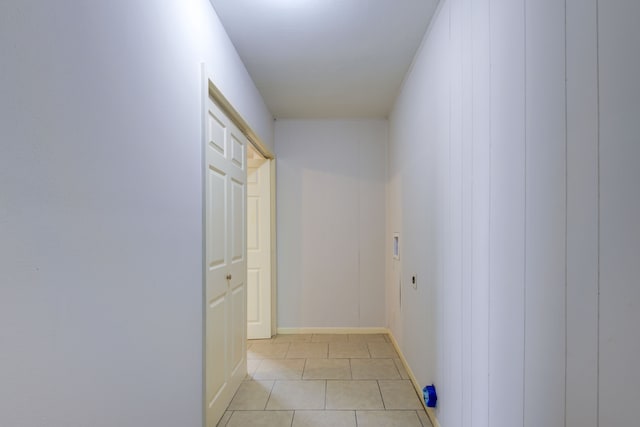 hallway featuring light tile patterned floors