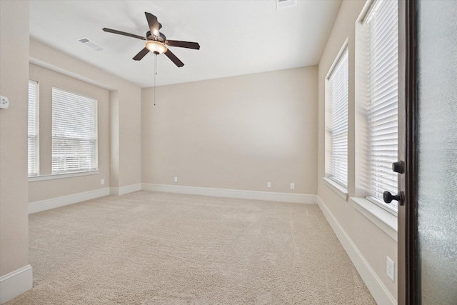 27018 Camirillo Creek Ln, Katy, TX 77494 - spare room featuring a ceiling fan, light colored carpet, visible vents, and baseboards