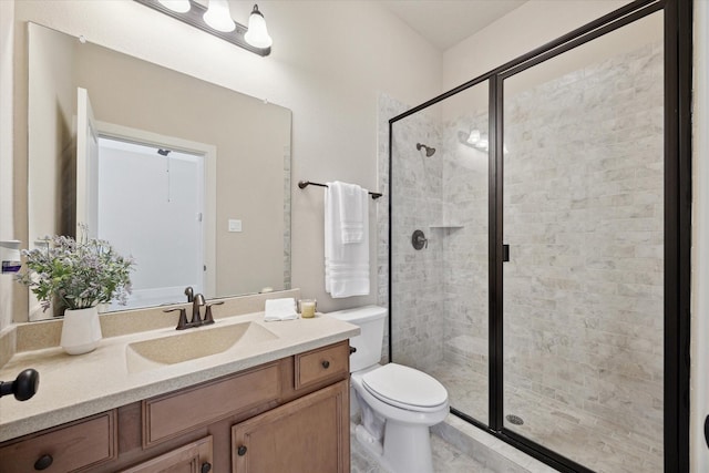 27018 Camirillo Creek Ln, Katy, TX 77494 - bathroom with vanity, toilet, and a shower stall