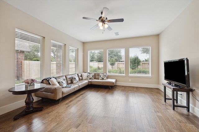 27018 Camirillo Creek Ln, Katy, TX 77494 - living room featuring baseboards, ceiling fan, visible vents, and wood finished floors