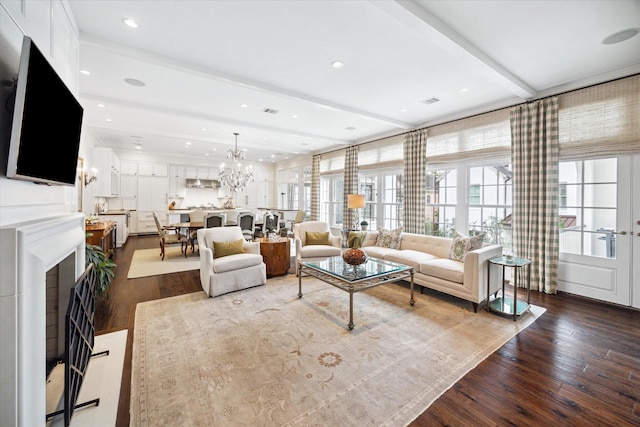 56 Audubon Hollow Ln, Houston, TX 77027 - living room featuring recessed lighting, visible vents, dark wood-style floors, and a notable chandelier