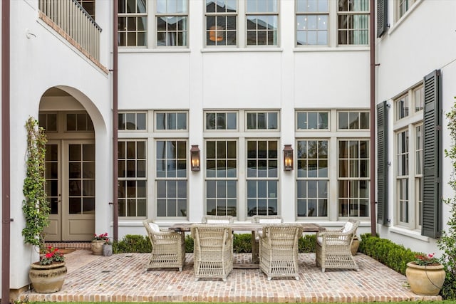 56 Audubon Hollow Ln, Houston, TX 77027 - view of patio / terrace with outdoor dining space