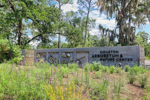56 Audubon Hollow Ln, Houston, TX 77027 - community sign featuring a detached garage