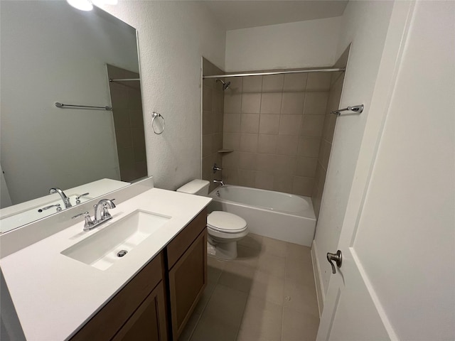 full bathroom with a textured wall, vanity, toilet, tile patterned floors, and bathing tub / shower combination