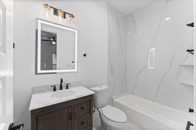 bathroom with toilet, ceiling fan, bathtub / shower combination, and vanity