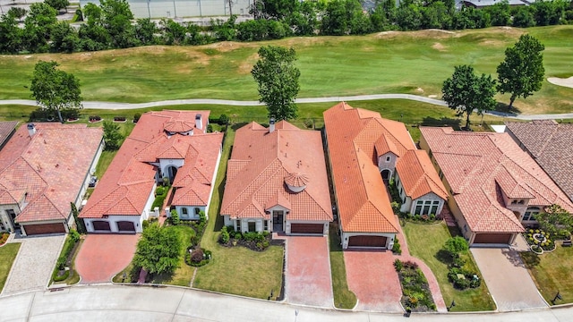 birds eye view of property with golf course view