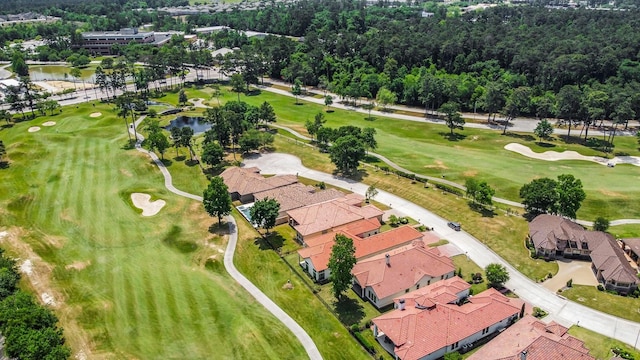 aerial view with a water view, a residential view, and golf course view