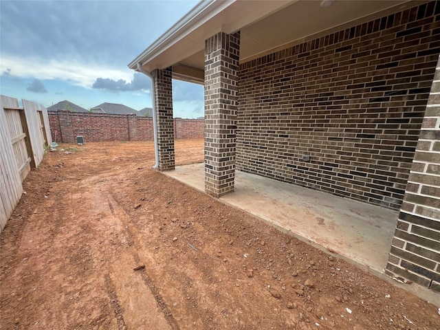 exterior space with a fenced backyard