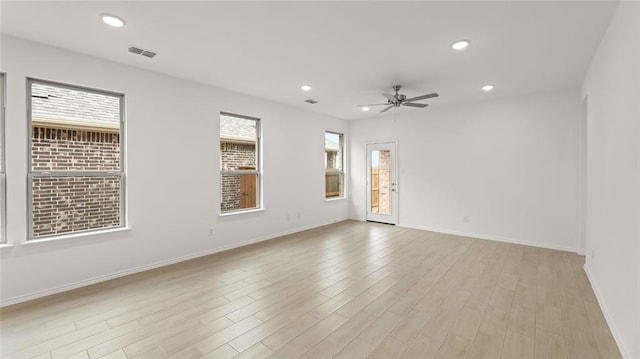 spare room with visible vents, a ceiling fan, light wood-style flooring, and recessed lighting
