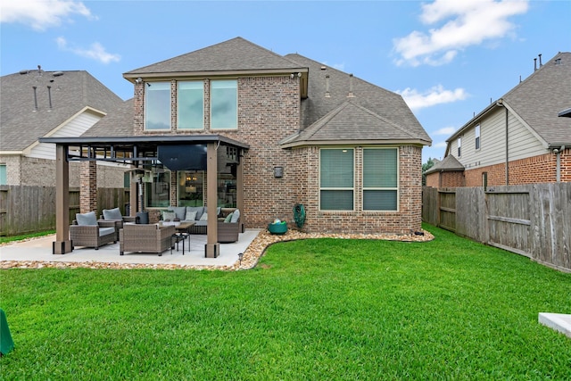 rear view of property featuring brick siding, outdoor lounge area, a shingled roof, and a fenced backyard