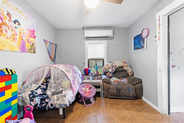 925 New Laredo Hwy, San Antonio, TX 78211 - tiled bedroom with baseboards, a wall mounted AC, and a ceiling fan