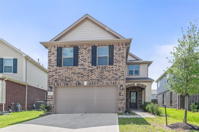 view of front of home with driveway, a front yard, a garage, brick siding, and central AC