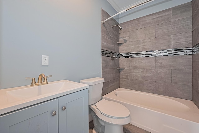 bathroom with vanity, shower / tub combination, and toilet
