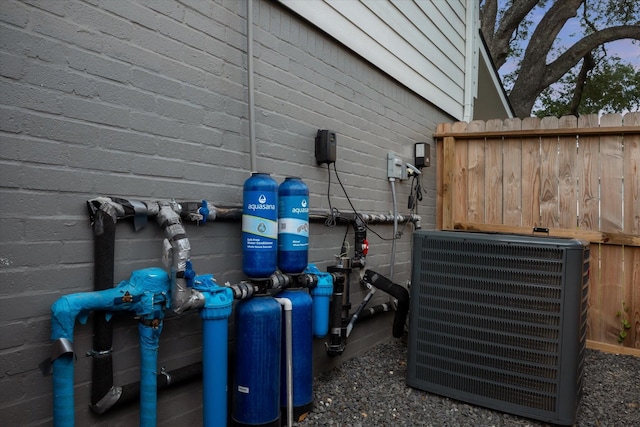 details with fence and cooling unit