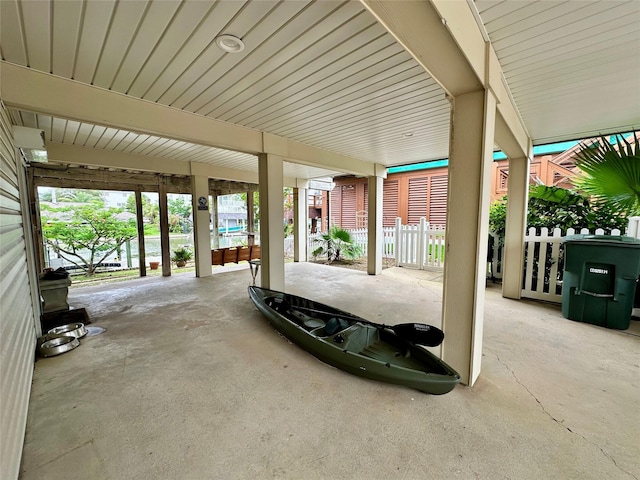 12828 E Madrid, Galveston, TX 77554 - view of patio featuring fence