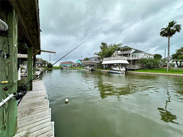12828 E Madrid, Galveston, TX 77554 - view of dock featuring a water view