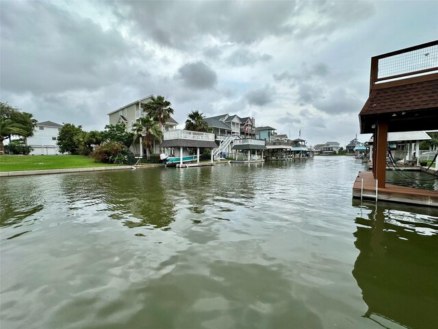 12828 E Madrid, Galveston, TX 77554 - dock area featuring a water view