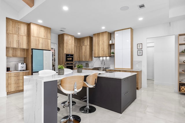 kitchen with oven, open shelves, a sink, freestanding refrigerator, and modern cabinets