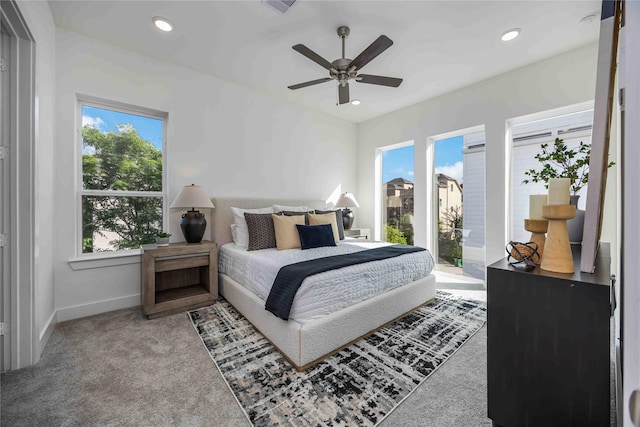 carpeted bedroom featuring baseboards, a ceiling fan, visible vents, and recessed lighting