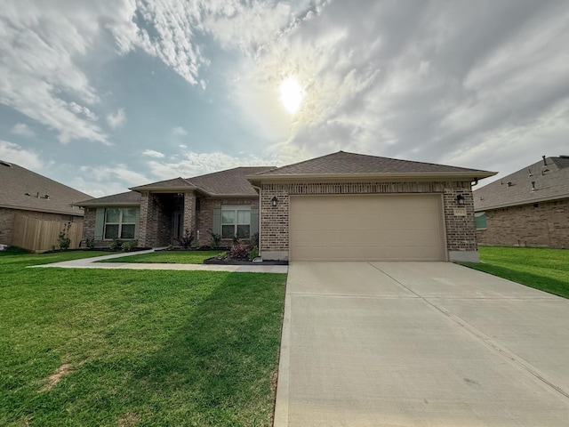 view of front facade with brick siding, a front lawn, an attached garage, and concrete driveway