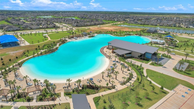 2223 Inglenook Grove Dr, Katy, TX 77493 - aerial perspective of suburban area featuring a pool and a nearby body of water