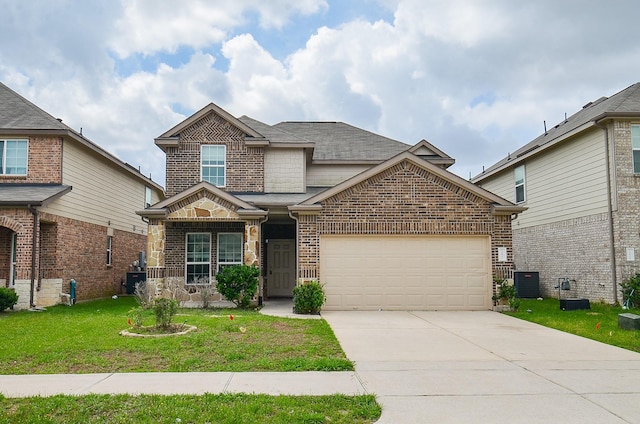 traditional-style home with a front yard, cooling unit, brick siding, concrete driveway, and an attached garage