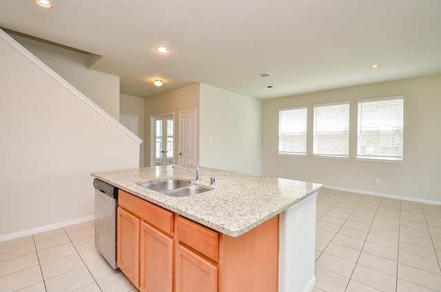 kitchen with stainless steel dishwasher, light tile patterned flooring, baseboards, recessed lighting, and a sink