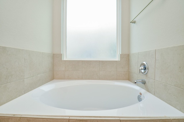 full bath with a bath