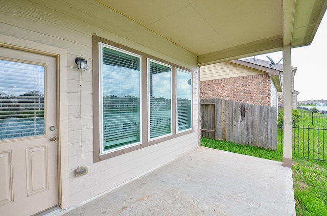view of patio with fence