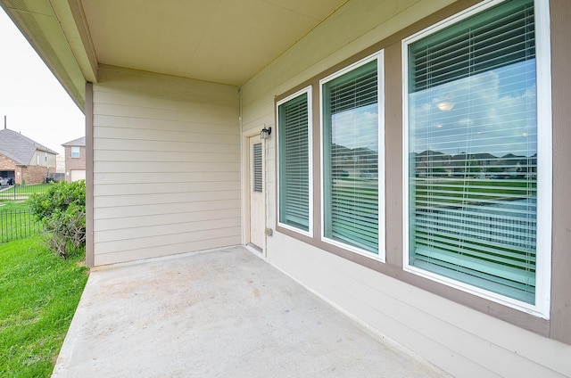 view of patio / terrace featuring fence