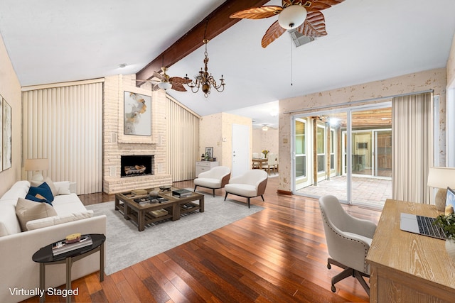 6103 Gallant Forest Dr, Houston, TX 77088 - living area with wood-type flooring, visible vents, a fireplace, lofted ceiling with beams, and ceiling fan with notable chandelier