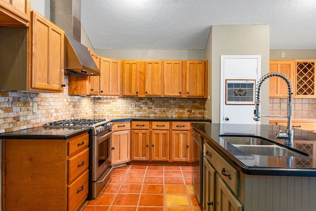 6103 Gallant Forest Dr, Houston, TX 77088 - kitchen featuring appliances with stainless steel finishes, a sink, a textured ceiling, dark stone counters, and decorative backsplash