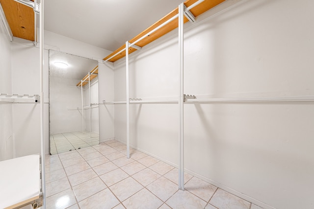 6103 Gallant Forest Dr, Houston, TX 77088 - spacious closet featuring light tile patterned flooring