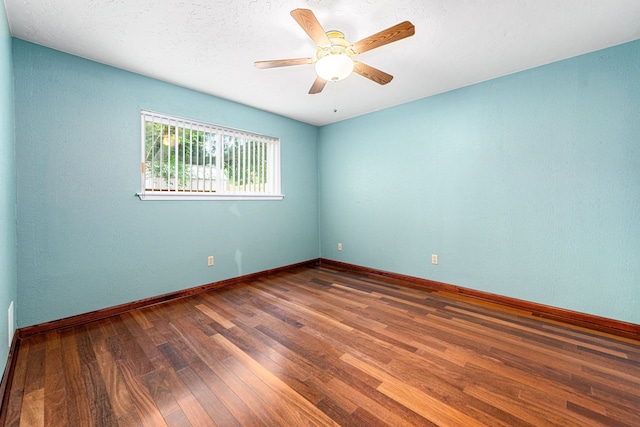 6103 Gallant Forest Dr, Houston, TX 77088 - spare room featuring baseboards, a ceiling fan, and hardwood / wood-style flooring