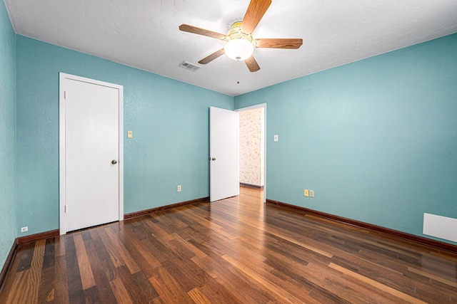 6103 Gallant Forest Dr, Houston, TX 77088 - unfurnished bedroom with baseboards, ceiling fan, wood finished floors, and visible vents