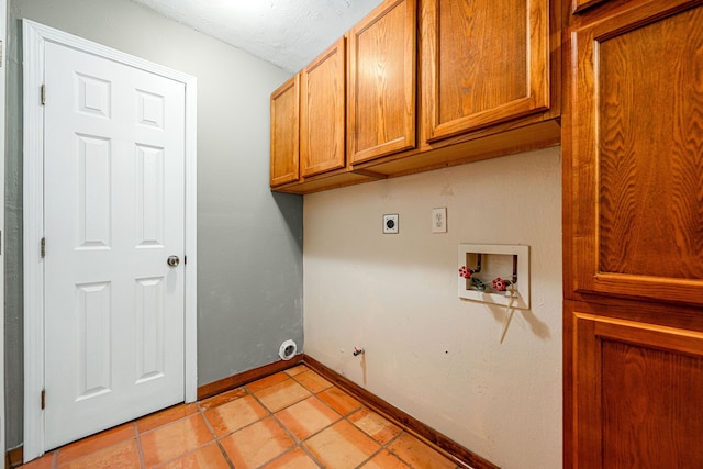 6103 Gallant Forest Dr, Houston, TX 77088 - washroom featuring cabinet space, hookup for a washing machine, electric dryer hookup, baseboards, and light tile patterned floors