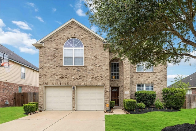 traditional home featuring fence, an attached garage, driveway, and a front lawn