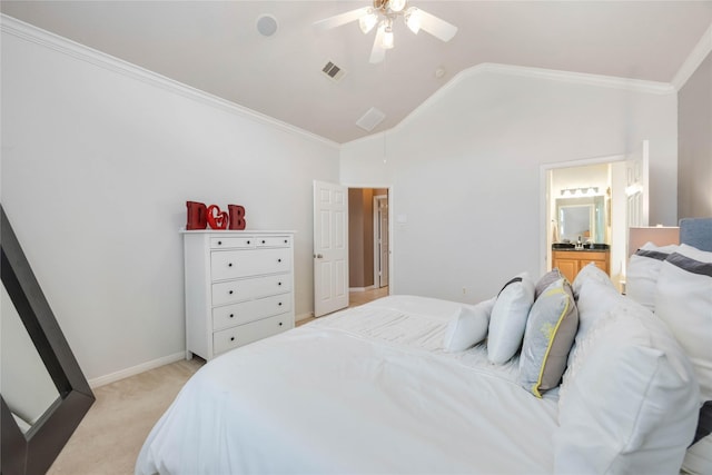 bedroom featuring a ceiling fan, visible vents, crown molding, lofted ceiling, and light carpet