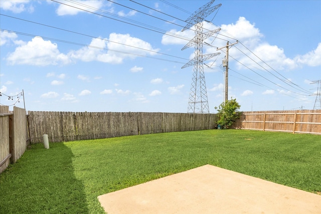view of yard featuring a fenced backyard and a patio